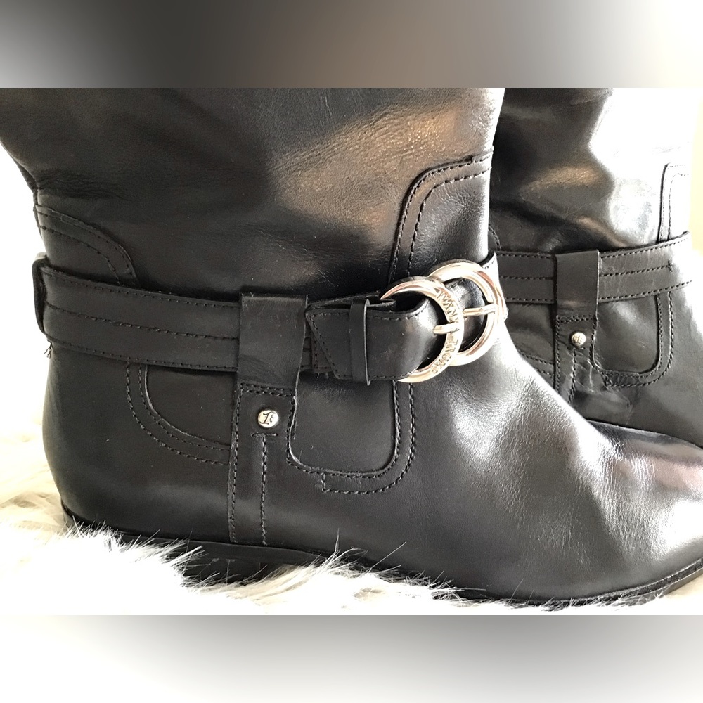 Black leather Ivanka Trump boots